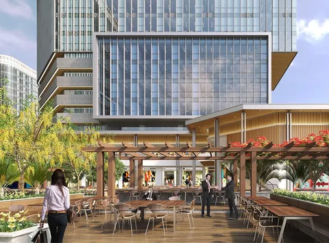 Render of an outdoor food terrace with pergola below the office tower